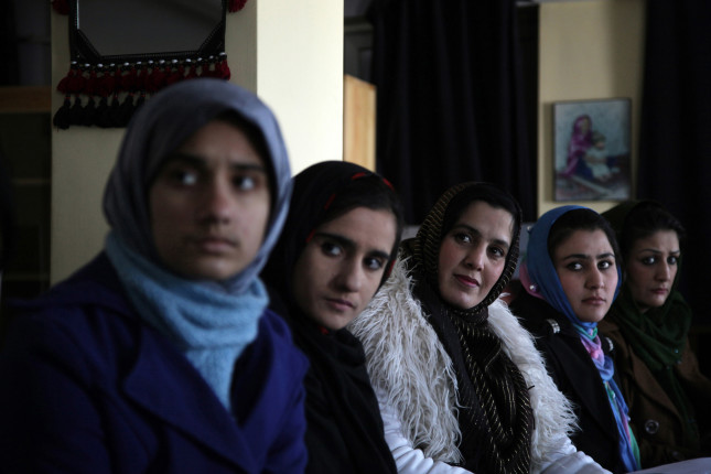 Kabul. Afghanistan. 2012
A meeting of Mirman Baheer, the Ladies’ Literary Society, in Kabul.  The group has roughly one hundred members in Kabul, where they meet openly on most Saturdays. The city of Kabul is, in many ways, a bubble. Its security allows women to gather openly, a near impossibility across most of the country. Outside Kabul, there are as many as three hundred members in the outlying provinces of Khost, Paktia, Wardak, Mazar, Kunduz, Jalalabad, Kandahar, Herat, and Farah. Exact numbers of members are impossible to come by, since the society operates in secret by necessity.
